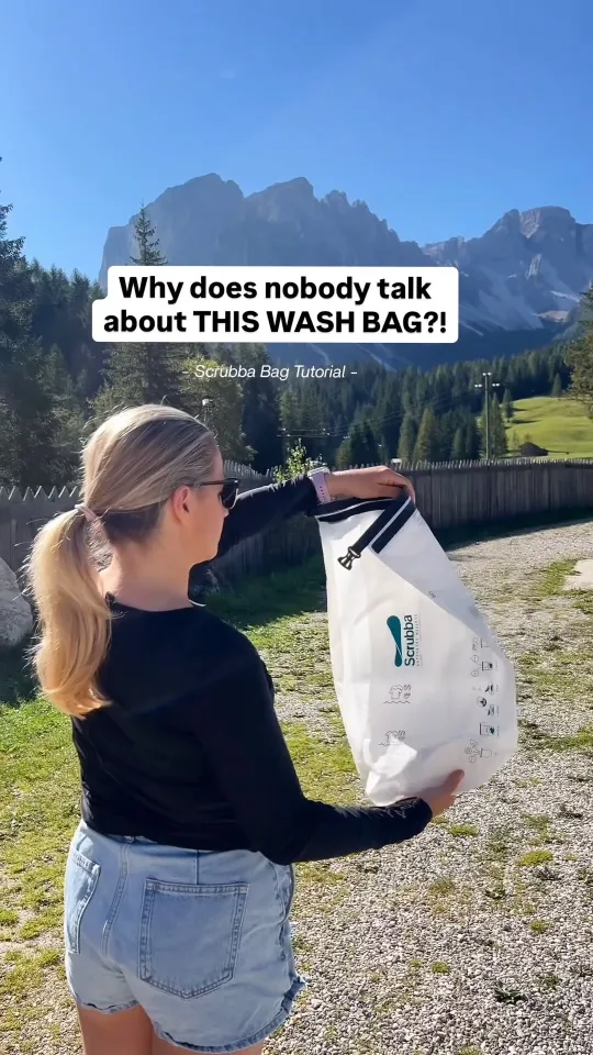 UGC ad for an e-commerce brand: creator holding a travel wash bag with the hook "Why does nobody talk about THIS WASH BAG?!"