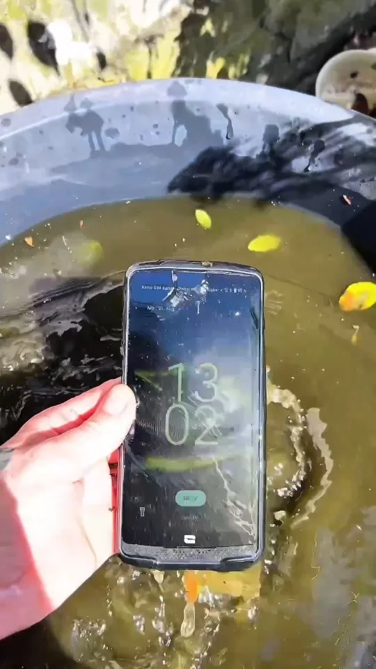 UGC ad for a consumer tech brand: rugged smartphone still running after being dunked in a bucket of water