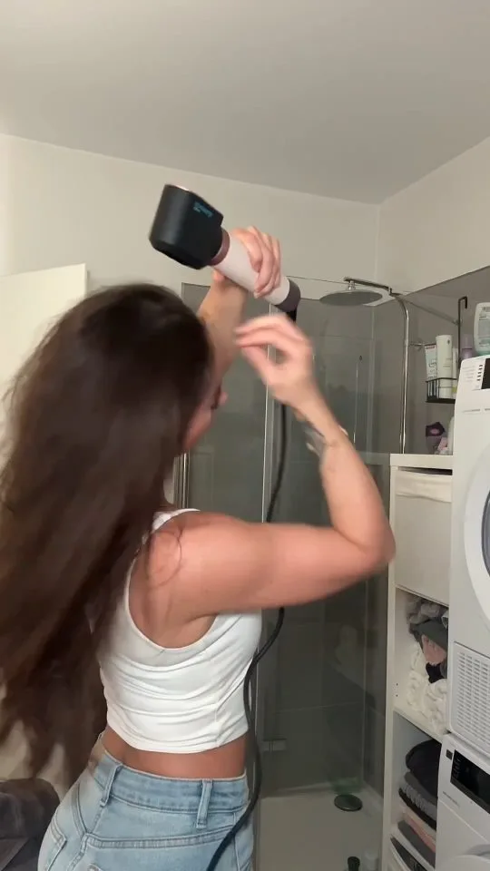 Product test UGC: a creator blow-dries her hair after using Foamie hair cream