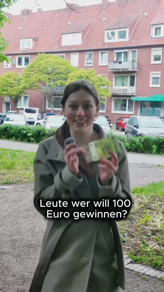 Street UGC: a creator asks passers-by who wants to win 100 euros